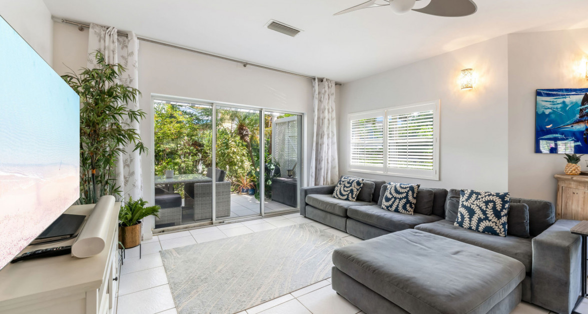 105 COCONUT BAY | UPGRADED END-UNIT TOWNHOUSE IN A QUIET, OCEANFRONT COMMUNITY - Image 1