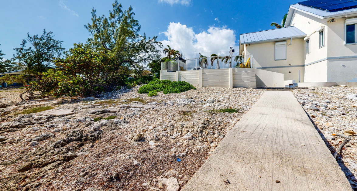 Beachfront Retreat with Pool and Stunning Views - Image 4