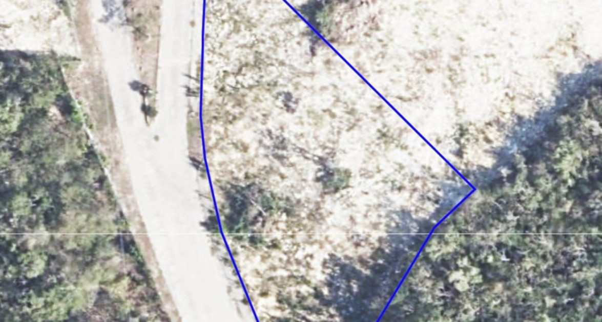 Breakers Partially Filled Lot with access to CUC and water - Image 1