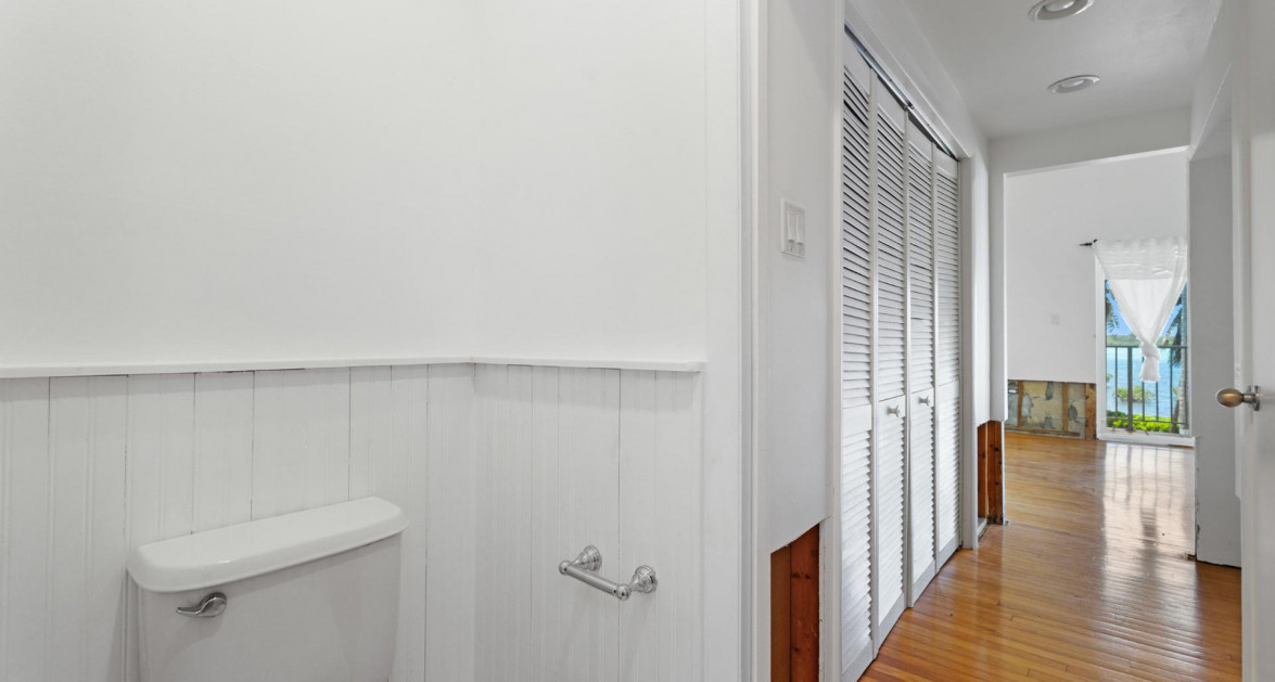 BY THE SEA #7 | SOUTH SOUND – OCEANFRONT END UNIT WITH RENOVATION REQUIRED - Image 11