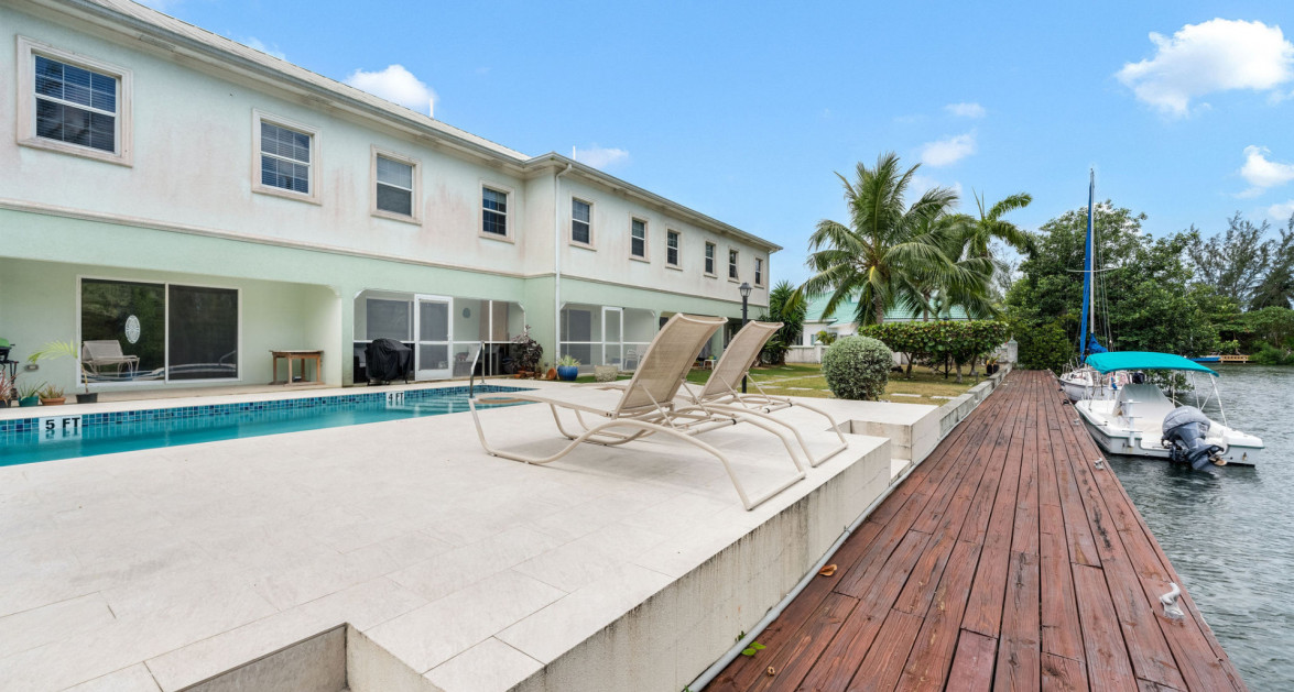 Canal Front Large 2 bed 2.5 bath Townhome in Omega Bay with Dock Space