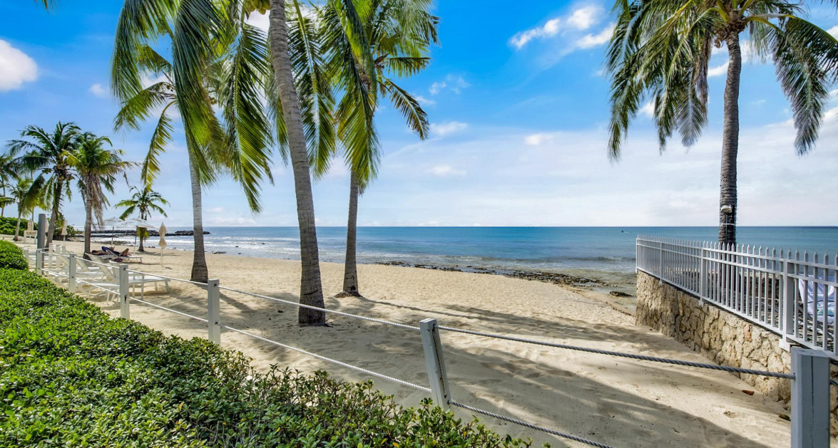CRESCENT POINT UNIT #14 | SEVEN MILE BEACH - Fully Remodeled, Turnkey & Income-Producing Opportunity - Image 1