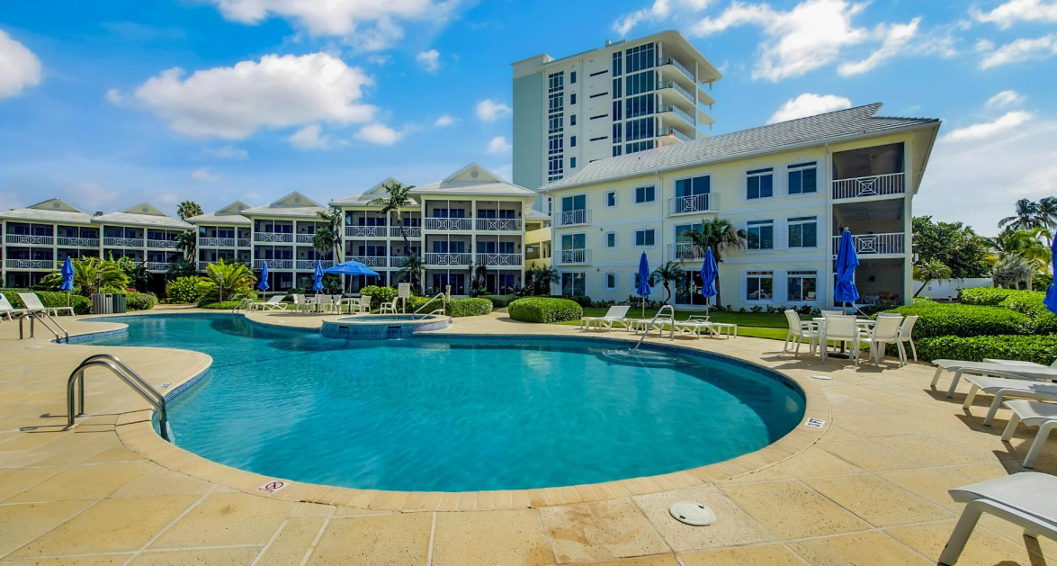 CRESCENT POINT UNIT #14 | SEVEN MILE BEACH - Fully Remodeled, Turnkey & Income-Producing Opportunity - Image 2