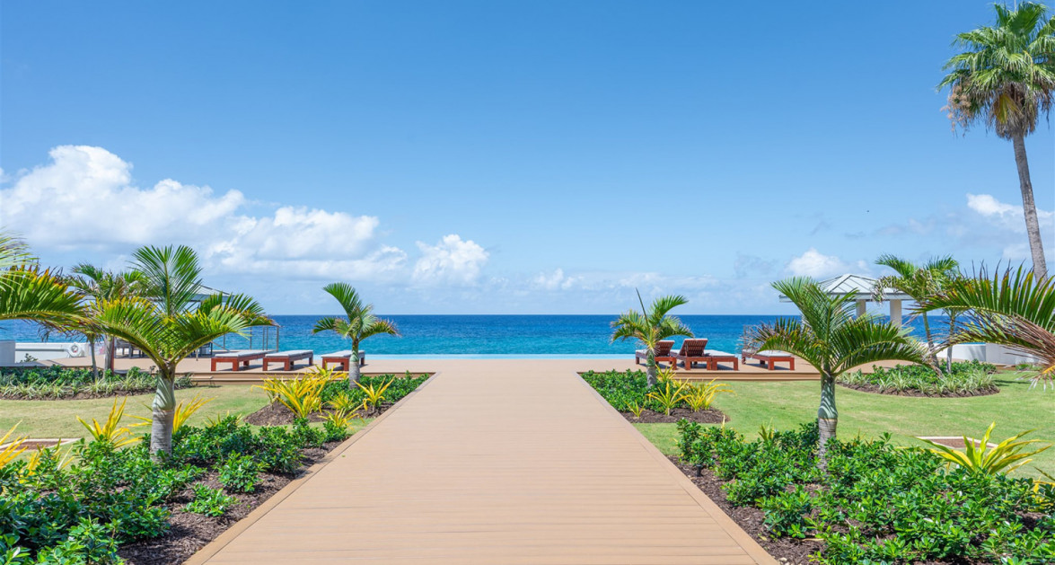 Elevated Elegance: Three-Level Oceanfront Penthouse - Image 1