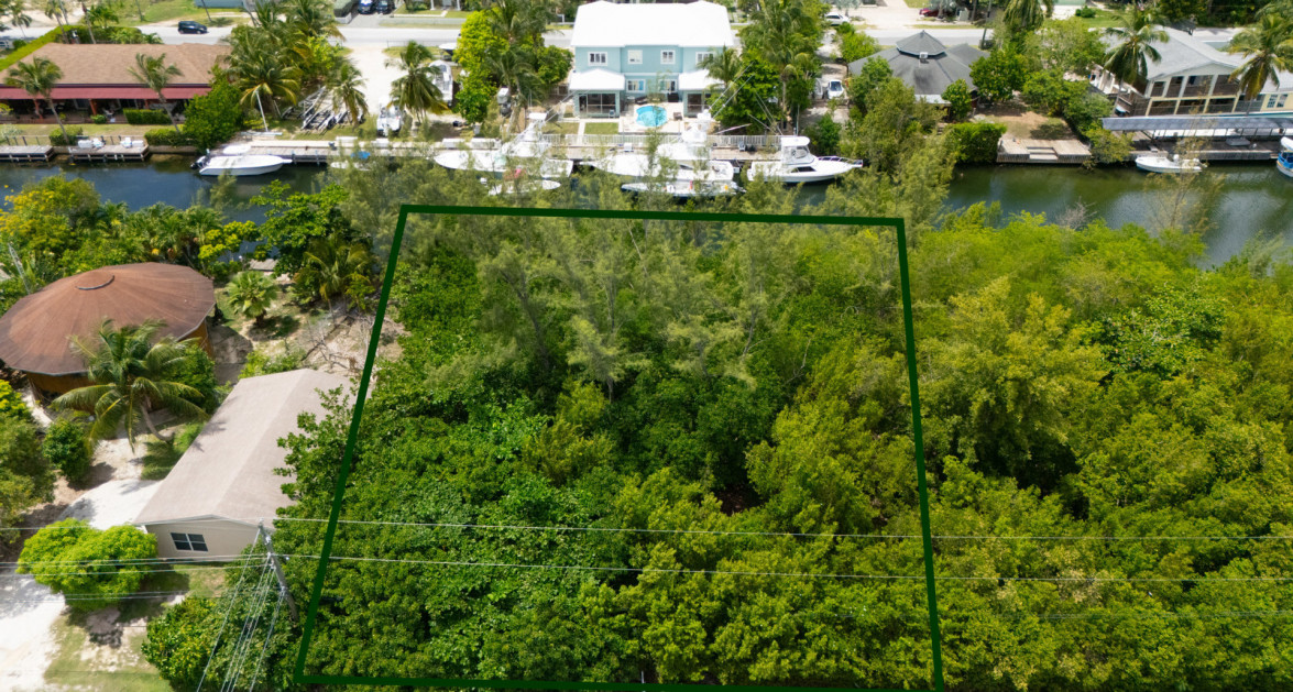 Omega Bay Canal Front Duplex/House Parcel (0.2984 Acre) - Image 1