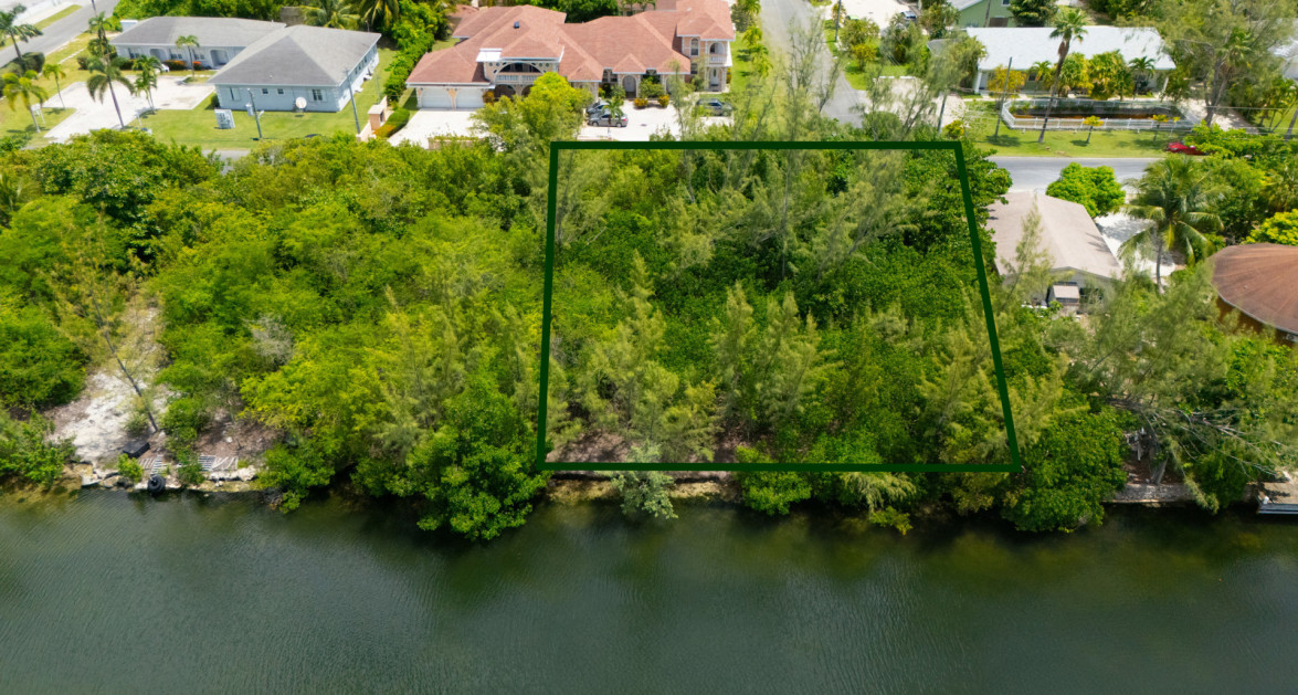 Omega Bay Canal Front Duplex/House Parcel (0.2984 Acre) - Image 4
