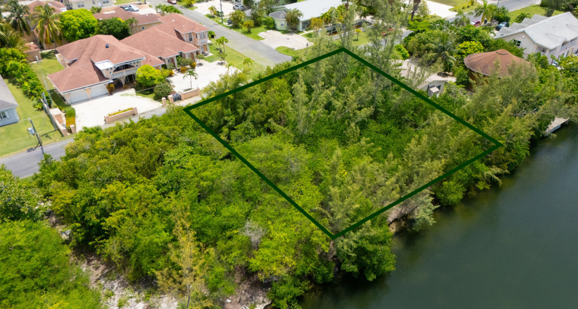 Omega Bay Canal Front Duplex/House Parcel (0.2984 Acre) - Image 5