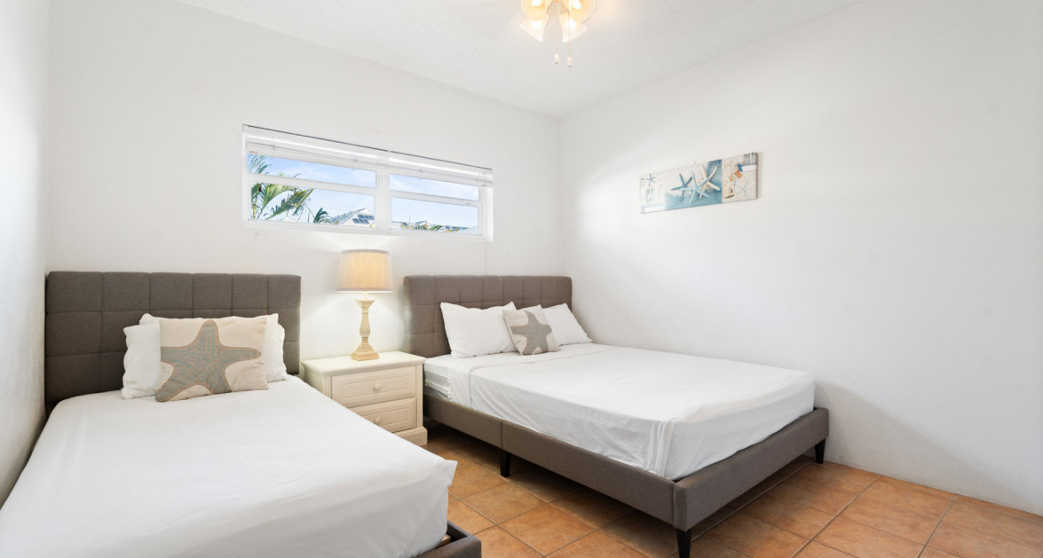 Plantation Village #44 | Seven Mile Beach – Pool & Garden View Condo with Great Rental Income - Image 22