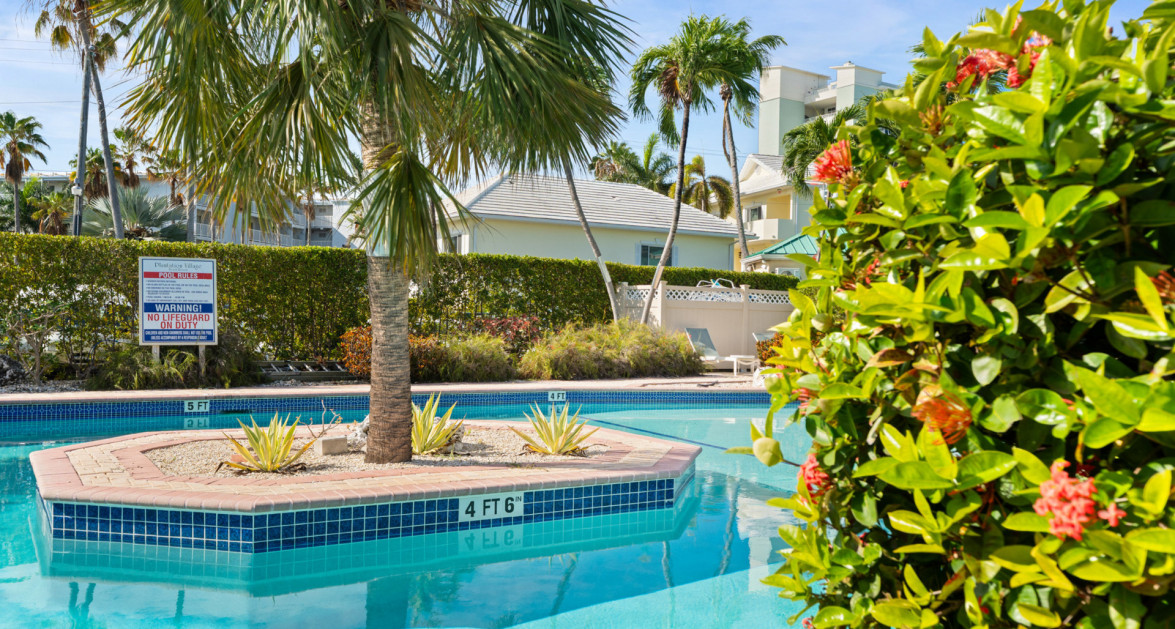 Plantation Village #44 | Seven Mile Beach – Pool & Garden View Condo with Great Rental Income - Image 1