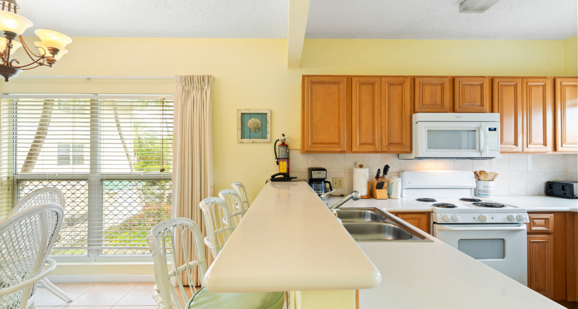 Plantation Village #44 | Seven Mile Beach – Pool & Garden View Condo with Great Rental Income - Image 11