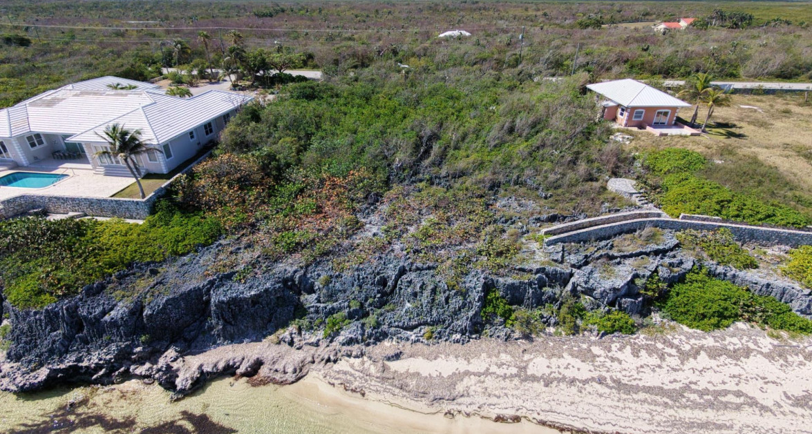 QUEEN’S HIGHWAY | EAST END – RARE PRIVATE BEACHFRONT LAND WITH APPROVED PLANNING, 0.61 ACRE - Image 1