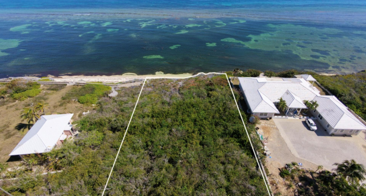 QUEEN’S HIGHWAY | EAST END – RARE PRIVATE BEACHFRONT LAND WITH APPROVED PLANNING, 0.61 ACRE - Image 7