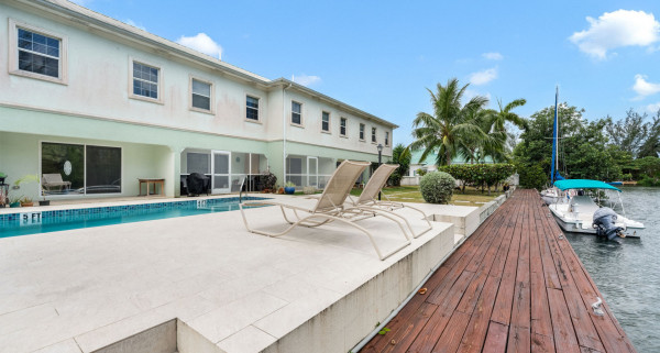 Canal Front Large 2 Bed 2.5 Bath Townhome In Omega Bay With Dock Space